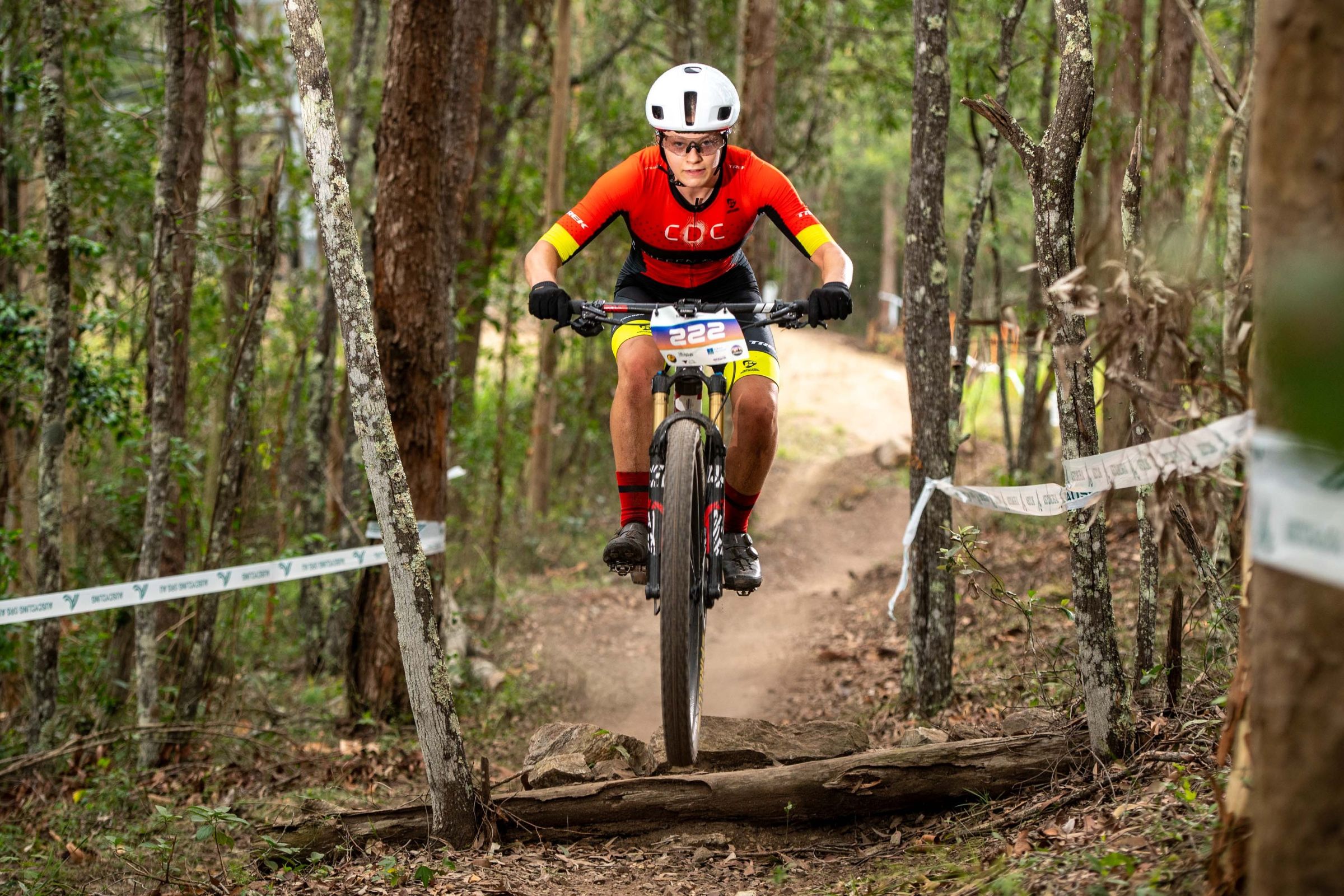 A cross-country mountain bike rider for the CDC team races in Awaba in 2026